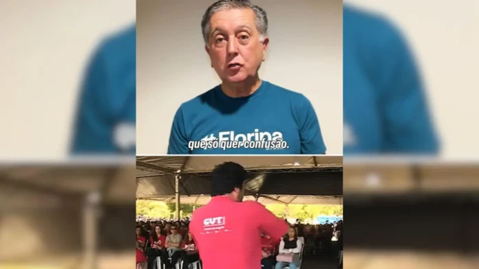 Apresentação de um homem com camiseta azul enquanto um orador fala em direção a uma plateia em uma tenda.